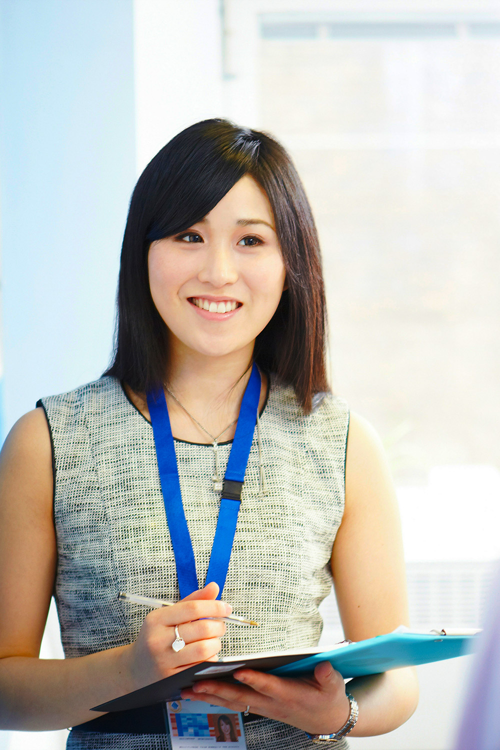 Female asian DON holding a clipboard