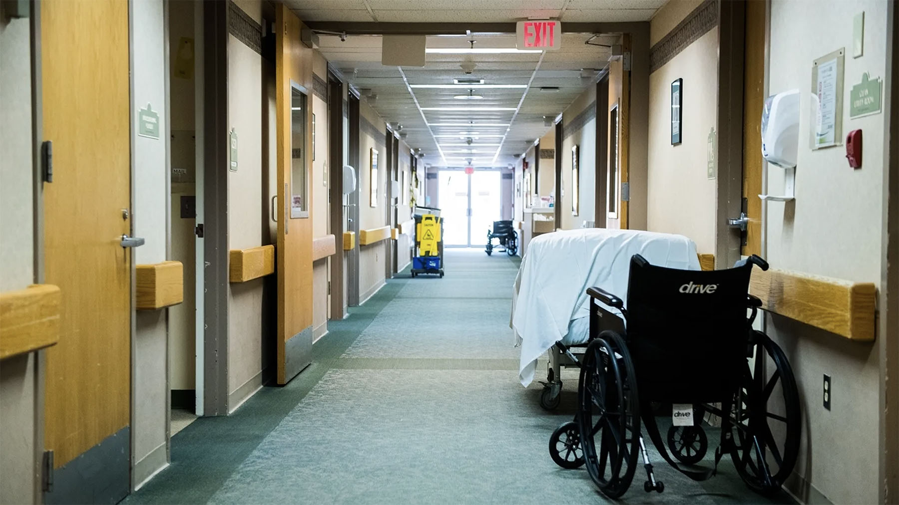 A hallway in a nursing home, empty of people